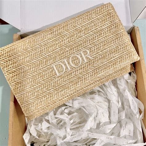 dior bag raffia|Dior raffia clutch bag.